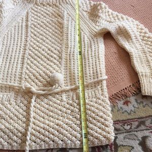 Handmade sweater with tie and pockets